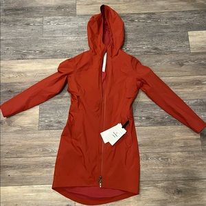 Brand New Lululemon Rain Rebel Jacket, Size 2, Cayenne Color, Adjustable Hood